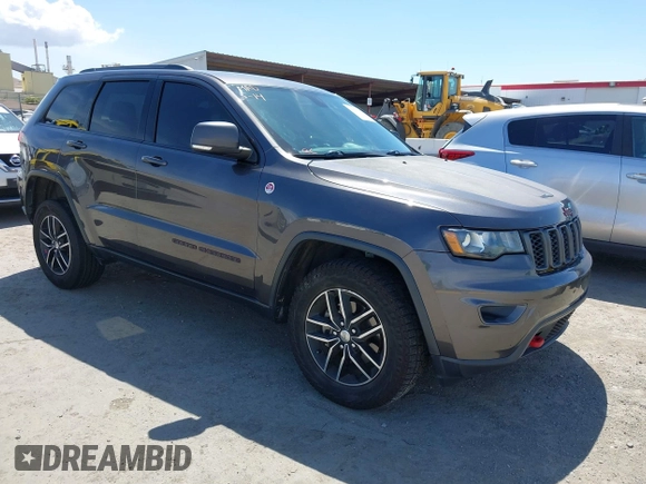 2017 Jeep Grand Cherokee Trailhawk with VIN 1C4RJFLG3HC877110, listed as a IAAI auction lot 42276506 with 144,993 mi miles and . Bid and sale history available at DreamBid. Image 1.