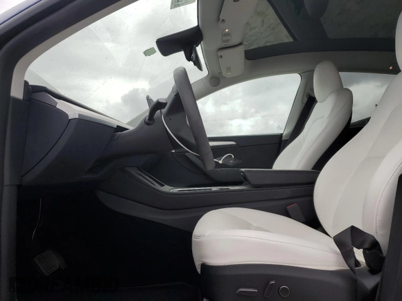 2023 Tesla Model Y Long Range z VIN 7SAYGDEE5PF787794, wystawiony jako Copart lot #55212605 z przebiegiem 30 277 mil mil oraz Szkoda całkowita • Salvage title. Historia ofert i sprzedaży dostępna na DreamBid. Obrazek 7.