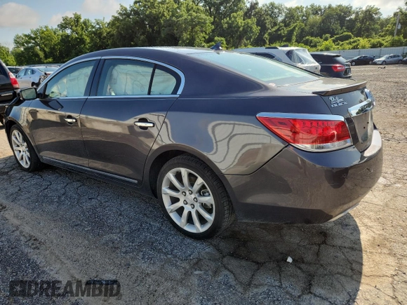 2013 Buick LaCrosse Touring с VIN 1G4GJ5E32DF245263, выставлен на аукционе Copart как лот 61476805 с пробегом 38 048 миль миль и Списание • Salvage title. История ставок и продаж доступна на DreamBid. Изображение 2.