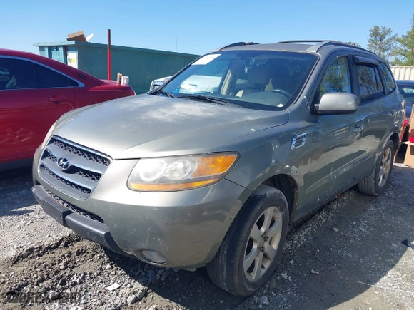 2009 Hyundai Santa Fe SE with VIN 5NMSH13E79H322081, listed as a IAAI auction lot 41767949 with 179,344 mi miles. Bid and sale history available at carsss.com. Image 2.