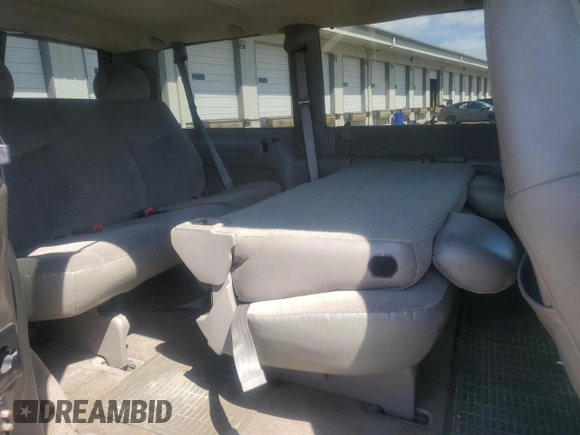 2003 GMC Safari z VIN 1GKDM19XX3B514754, wystawiony jako Copart lot #50744805 z przebiegiem 142 216 mil mil oraz Szkoda całkowita • Salvage title. Historia ofert i sprzedaży dostępna na DreamBid. Obrazek 11.