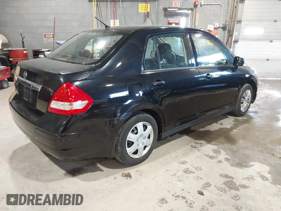 2011 Nissan Versa S with VIN 3N1BC1AP8BL447007, listed as a IAAI auction lot 41376039 with 131,257 mi miles and . Bid and sale history available at DreamBid. Image 4.