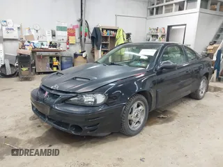 2005 Pontiac Grand Am GT with VIN 1G2NW12E85M140434, listed as a IAAI auction lot 41966294 with 142,548 mi miles. Bid and sale history available at carsss.com. Image 17.