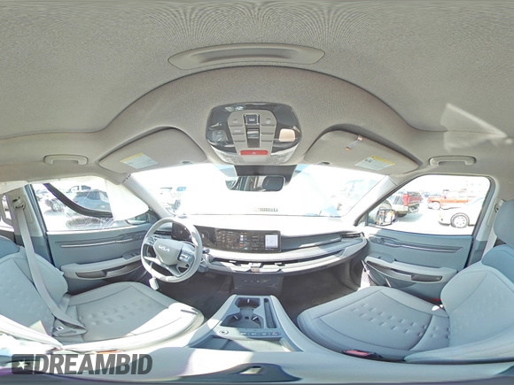 2024 Kia EV9 Wind z VIN KNDAFFS52R6030609, wystawiony jako Copart lot #72476804 z przebiegiem 8218 mil mil oraz Szkody całkowita. Historia ofert i sprzedaży dostępna na DreamBid. Obrazek 13.