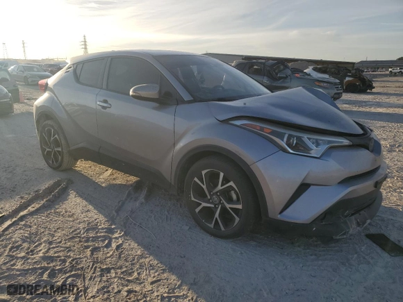 2018 Toyota C-HR XLE with VIN NMTKHMBX4JR042090, listed as a Copart auction lot 49549515 with 95,944 mi miles and Salvage Title. Bid and sale history available at carsss.com. Image 4.