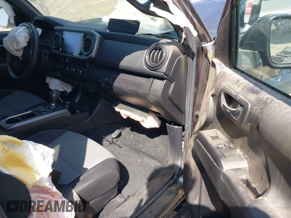 2021 Toyota Tacoma SR5 z VIN 3TMDZ5BN8MM117163, wystawiony jako IAAI lot #42070540 z przebiegiem 12 790 mil mil oraz . Historia ofert i sprzedaży dostępna na DreamBid. Obrazek 5.