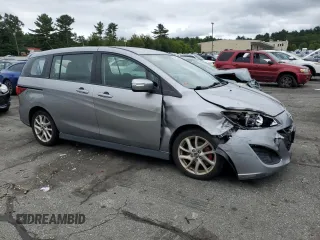2014 Mazda 5 Touring with VIN JM1CW2CL6E0174143, listed as a Copart auction lot 68129294 with 105,764 mi miles and Salvage Title. Bid and sale history available at carsss.com. Image 4.