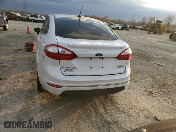 2017 Ford Fiesta Titanium with VIN 3FADP4CJ9HM136313, listed as a Copart auction lot 82610884 with Not Provided miles and Salvage Title. Bid and sale history available at DreamBid. Image 6.