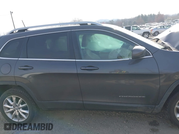 2016 Jeep Cherokee Limited z VIN 1C4PJLDB1GW272654, wystawiony jako IAAI lot #41793549 z przebiegiem Nie podano mil oraz . Historia ofert i sprzedaży dostępna na DreamBid. Obrazek 13.