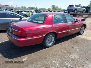 2002 Mercury Grand Marquis LS Premium z VIN 2MEFM75W22X653775, wystawiony jako IAAI lot #42225138 z przebiegiem 124 749 mil mil oraz . Historia ofert i sprzedaży dostępna na DreamBid. Obrazek 4.