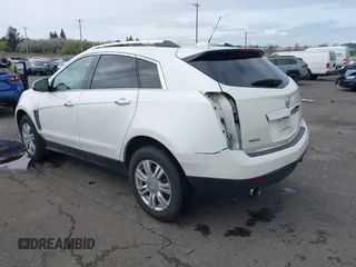 2016 Cadillac SRX Luxury Collection z VIN 3GYFNBE33GS507014, wystawiony jako IAAI lot #41979980 z przebiegiem 115 077 mil mil oraz . Historia ofert i sprzedaży dostępna na DreamBid. Obrazek 3.