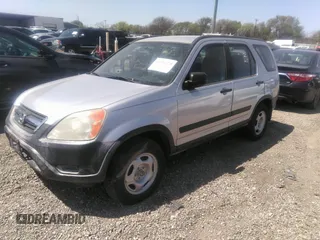 2002 Honda CR-V LX with VIN JHLRD685X2C022199, listed as a IAAI auction lot 41856270 with 169,632 mi miles and . Bid and sale history available at DreamBid. Image 2.