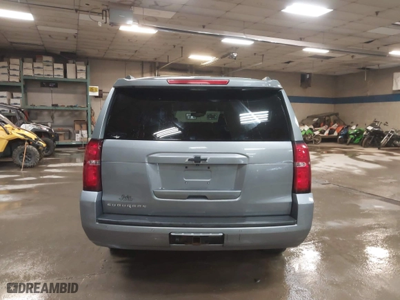 2019 Chevrolet Suburban LT with VIN 1GNSKHKC3KR195042, listed as a IAAI auction lot 41704591 with 107,166 mi miles. Bid and sale history available at carsss.com. Image 16.