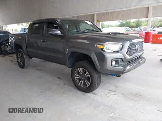 2019 Toyota Tacoma SR z VIN 3TMCZ5AN0KM248419, wystawiony jako IAAI lot #42324574 z przebiegiem Nie podano mil oraz . Historia ofert i sprzedaży dostępna na DreamBid. Obrazek 1.