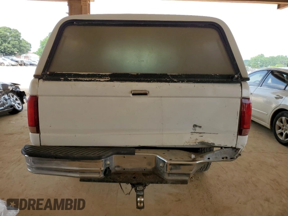 1997 Ford F-250 with VIN 1FTHX25F2VEC79419, listed as a Copart auction lot 53997013 with 321,335 mi miles and Salvage title. Bid and sale history available at DreamBid. Image 6.