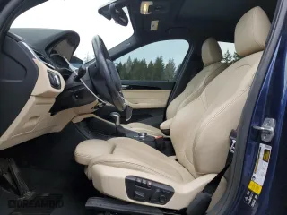 2018 BMW X1 xDrive28i with VIN WBXHT3C37J5F89432, listed as a Copart auction lot 49677075 with 141,684 mi miles and Salvage Title. Bid and sale history available at carsss.com. Image 7.