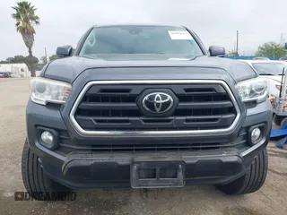 2018 Toyota Tacoma SR5 with VIN 5TFAZ5CNXJX066952, listed as a IAAI auction lot 41894562 with 141,818 mi miles and . Bid and sale history available at DreamBid. Image 12.