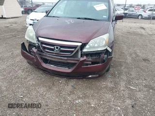 2007 Honda Odyssey Touring with VIN 5FNRL38847B048235, listed as a IAAI auction lot 41963652 with 176,412 mi miles. Bid and sale history available at carsss.com. Image 6.