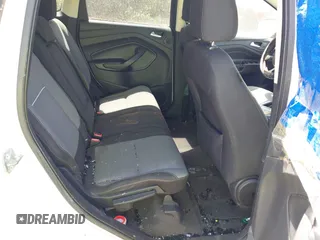 2014 Ford Escape SE z VIN 1FMCU9GX0EUC02583, wystawiony jako IAAI lot #42197013 z przebiegiem Nie podano mil oraz . Historia ofert i sprzedaży dostępna na DreamBid. Obrazek 8.