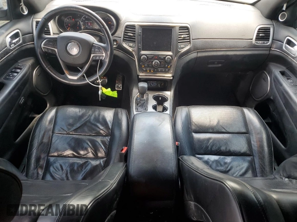 2018 Jeep Grand Cherokee High Altitude with VIN 1C4RJFCG5JC179040, listed as a Copart auction lot 61540625 with 135,310 mi miles and Salvage title. Bid and sale history available at DreamBid. Image 8.