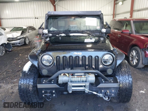 2008 Jeep Wrangler Unlimited Rubicon with VIN 1J8GA69108L562705, listed as a IAAI auction lot 41306923 with 150,002 mi miles and . Bid and sale history available at DreamBid. Image 12.