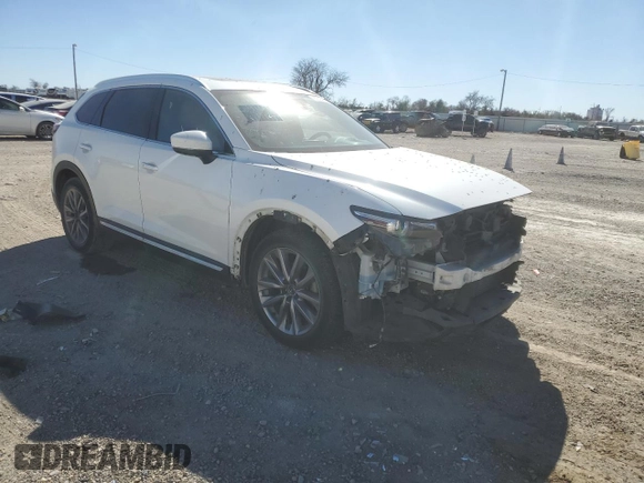 2021 Mazda CX-9 Grand Touring with VIN JM3TCADYXM0507401, listed as a Copart auction lot 89394535 with 69,506 mi miles and Salvage title. Bid and sale history available at DreamBid. Image 4.