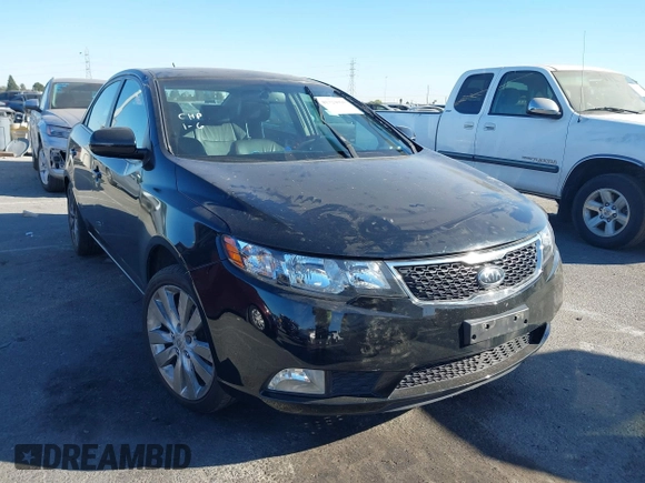 2012 Kia Forte SX with VIN KNAFW4A32C5623357, listed as a IAAI auction lot 41324098 with 217,354 mi miles. Bid and sale history available at carsss.com. Image 1.