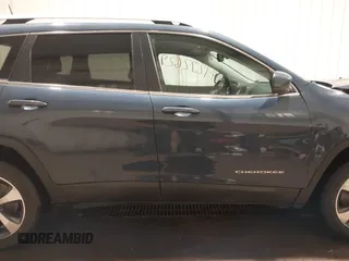 2020 Jeep Cherokee Limited with VIN 1C4PJMDX2LD516951, listed as a IAAI auction lot 41272629 with 99,717 mi miles and . Bid and sale history available at DreamBid. Image 13.