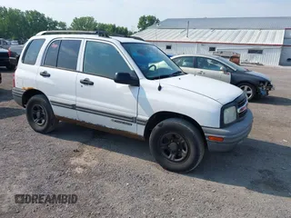 2003 Chevrolet Tracker z VIN 2CNBJ13C236911259, wystawiony jako IAAI lot #42447129 z przebiegiem 122 370 mil mil oraz . Historia ofert i sprzedaży dostępna na DreamBid. Obrazek 1.