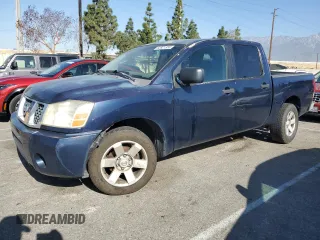 2006 Nissan Titan SE z VIN 1N6AA07A56N500115, wystawiony jako Copart lot #52821355 z przebiegiem 142 583 mil mil oraz Szkoda całkowita • Salvage title. Historia ofert i sprzedaży dostępna na DreamBid. Obrazek 1.