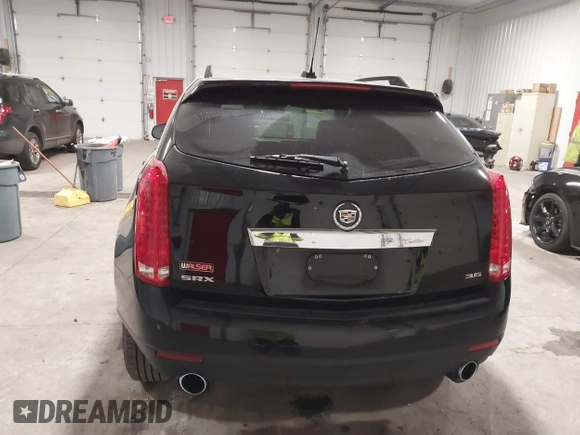 2015 Cadillac SRX with VIN 3GYFNAE36FS519604, listed as a IAAI auction lot 41215296 with 70,954 mi miles and . Bid and sale history available at DreamBid. Image 16.