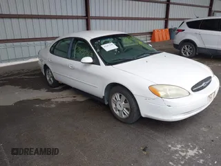 2002 Ford Taurus SE Standard z VIN 1FAFP53U22G250373, wystawiony jako IAAI lot #42287240 z przebiegiem 223 541 mil mil oraz . Historia ofert i sprzedaży dostępna na DreamBid. Obrazek 1.