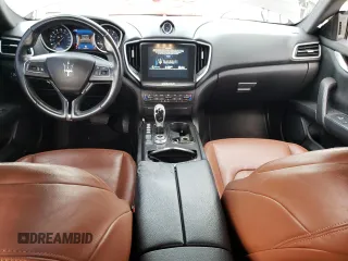 2017 Maserati Ghibli with VIN ZAM57XSA3H1218841, listed as a Copart auction lot 64325043 with 74,702 mi miles. Bid and sale history available at carsss.com. Image 8.