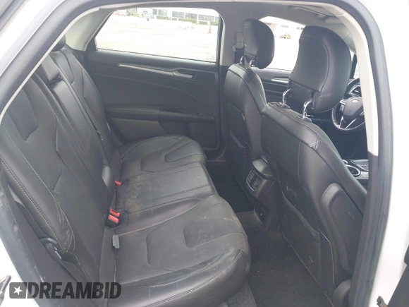 2013 Ford Fusion Titanium Hybrid with VIN 3FA6P0RUXDR386675, listed as a IAAI auction lot 42013986 with 89,349 mi miles. Bid and sale history available at carsss.com. Image 8.