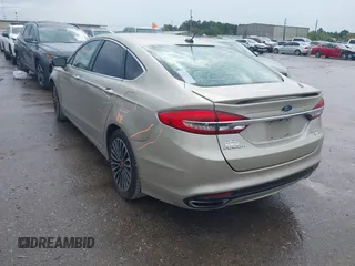 2018 Ford Fusion Titanium with VIN 3FA6P0D9XJR241859, listed as a IAAI auction lot 41893946 with 125,189 mi miles and . Bid and sale history available at DreamBid. Image 3.