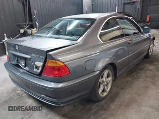 2001 BMW 3 Series 325Ci with VIN WBABN33471JW48292, listed as a IAAI auction lot 41557412 with 118,000 mi miles. Bid and sale history available at carsss.com. Image 4.