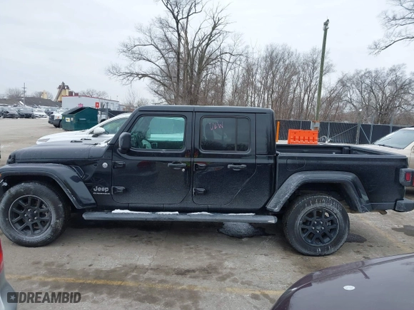2023 Jeep Gladiator Overland with VIN 1C6HJTFG4PL564093, listed as a IAAI auction lot 41594203 with 37,740 mi miles. Bid and sale history available at carsss.com. Image 14.