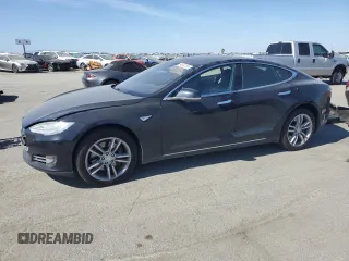 2016 Tesla Model S 90D with VIN 5YJSA1E2XGF129106, listed as a Copart auction lot 59162185 with 136,004 mi miles and Salvage title. Bid and sale history available at DreamBid. Image 1.