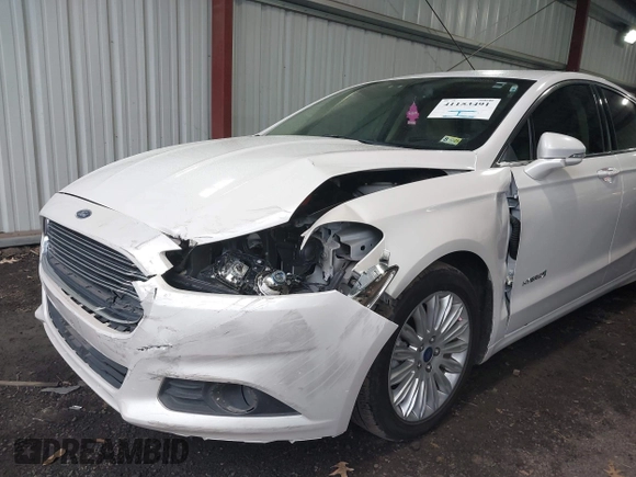 2013 Ford Fusion SE Hybrid with VIN 3FA6P0LU1DR357428, listed as a IAAI auction lot 41153491 with 153,738 mi miles. Bid and sale history available at carsss.com. Image 6.