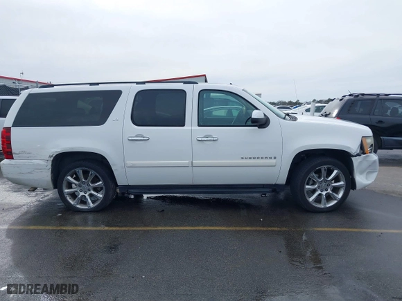 2008 Chevrolet Suburban LTZ with VIN 1GNFC16018R143195, listed as a IAAI auction lot 41577367 with 223,506 mi miles. Bid and sale history available at carsss.com. Image 13.
