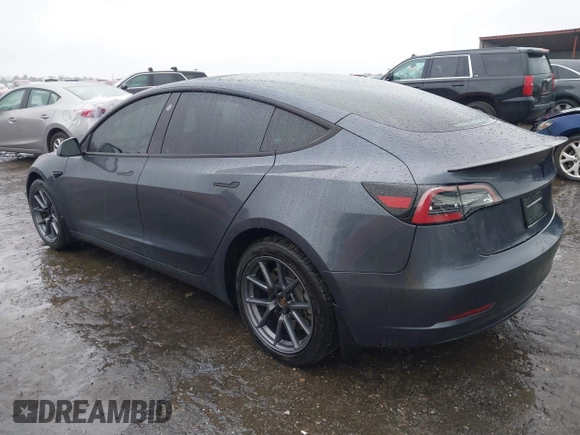 2023 Tesla Model 3 z VIN 5YJ3E1EA3PF579776, wystawiony jako IAAI lot #41537794 z przebiegiem Nie podano mil oraz . Historia ofert i sprzedaży dostępna na DreamBid. Obrazek 3.