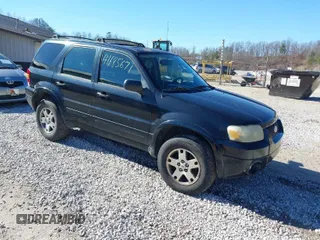 2005 Ford Escape Limited with VIN 1FMCU04155KE23314, listed as a IAAI auction lot 41685671 with 265,731 mi miles. Bid and sale history available at carsss.com. Image 1.