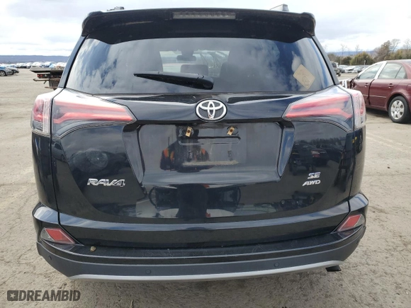 2017 Toyota RAV4 SE with VIN 2T3JFREVXHW657083, listed as a Copart auction lot 49790345 with 83,648 mi miles and Salvage Title. Bid and sale history available at carsss.com. Image 6.