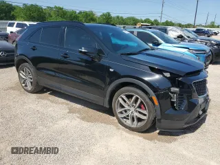 2021 Cadillac XT4 FWD Sport with VIN 1GYFZER44MF015908, listed as a Copart auction lot 52214925 with 94,079 mi miles and Clean Title. Bid and sale history available at carsss.com. Image 4.