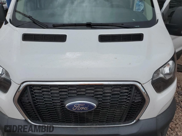 2021 Ford Transit Cargo with VIN 1FTYE1Y86MKB00604, listed as a Copart auction lot 69333594 with 60,464 mi miles and Salvage Title. Bid and sale history available at carsss.com. Image 12.