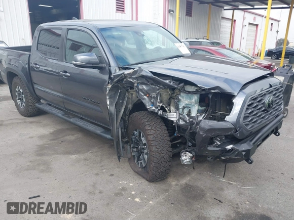2021 Toyota Tacoma SR z VIN 3TMCZ5AN9MM397611, wystawiony jako IAAI lot #41467705 z przebiegiem 65 191 mil mil oraz . Historia ofert i sprzedaży dostępna na DreamBid. Obrazek 1.