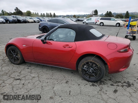 2021 Mazda MX-5 Miata Sport с VIN JM1NDAB78M0454772, выставлен на аукционе Copart как лот 63319665 с пробегом 58 373 миль миль и Списание • Salvage title. История ставок и продаж доступна на DreamBid. Изображение 2.