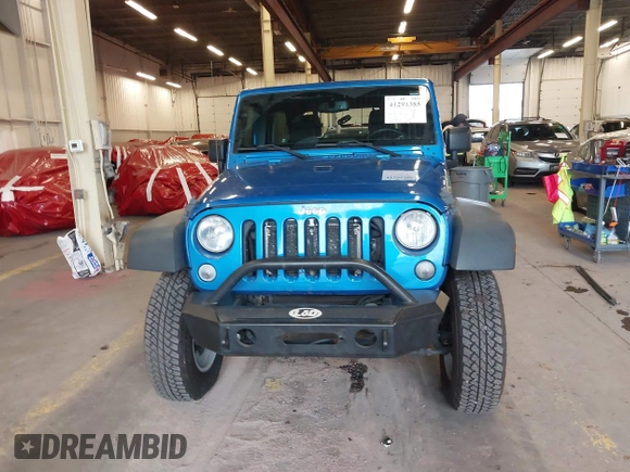 2015 Jeep Wrangler Unlimited Rubicon with VIN 1C4BJWFG7FL661643, listed as a IAAI auction lot 41291385 with 112,785 mi miles. Bid and sale history available at carsss.com. Image 13.