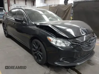 2014 Mazda Mazda6 i Touring with VIN JM1GJ1T67E1125290, listed as a IAAI auction lot 42041112 with 114,875 mi miles. Bid and sale history available at carsss.com. Image 1.