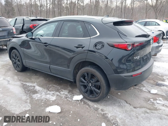 2021 Mazda CX-30 Premium with VIN 3MVDMBDY1MM269353, listed as a IAAI auction lot 41644391 with 29,409 mi miles and . Bid and sale history available at carsss.com. Image 3.